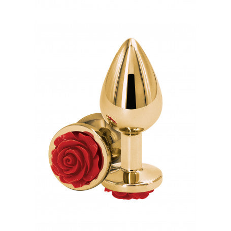 Plug anale in alluminio dorato con una delicata rosa rossa sulla base, sottolineando la combinazione di estetica e funzionalità. Acquista ora su desirevibe.com